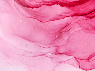 Fototapeta premium Background texture of alcohol ink in red color. Abstract fire paint with drops and stains.