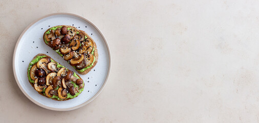 Bruschetta with mushrooms and avocados. Healthy eating. Vegetarian food. Keto diet.