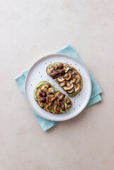 Bruschetta with mushrooms and avocados. Healthy eating. Vegetarian food. Keto diet.