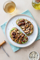 Bruschetta with mushrooms and avocados. Healthy eating. Vegetarian food. Keto diet.