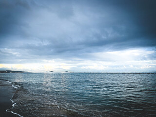 Fototapeta premium Dark clouds at the sea, evening time, dark seascape