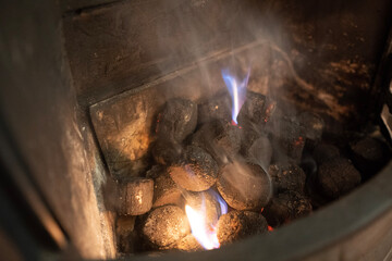 burning firewood in a fireplace