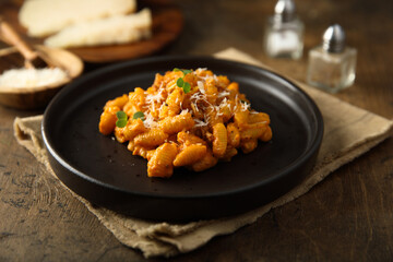 Pasta with red pesto and cheese