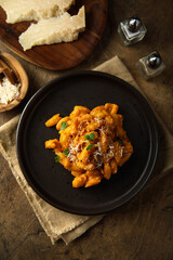 Pasta with red pesto and cheese