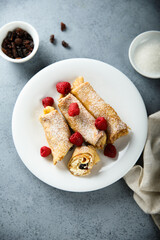 Homemade crepes with ricotta and raisins