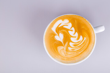 Hot and tasty cappuccino coffee in paper  cup, coffee to go 