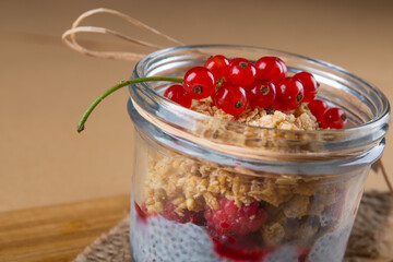 Chia Pudding with raspberry, currants and crunch muesli , tasty and healthy dessert 