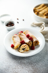 Homemade crepes with ricotta and raisins