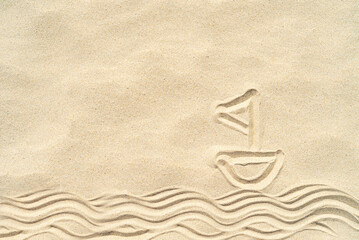 Fototapeta na wymiar A boat on the waves painted in the sand