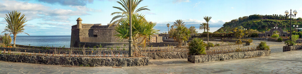 Walk along the sea with the Black Castle in Santa Cruz de Tenerife. Canary Islands.