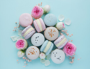 Tasty macaroons with beautiful roses