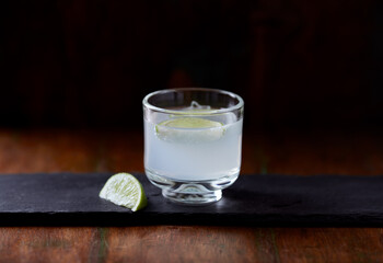 Gin and Tonic on dark background. Close up.	