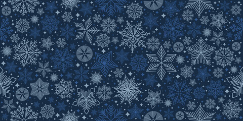 Christmas seamless pattern with geometric motifs. Snowflakes with different ornaments.