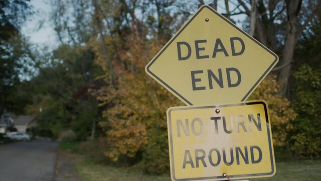 Dead end sign and No turn Aroundon a country road near the forest, where the entrance to the residential area. NY, USA