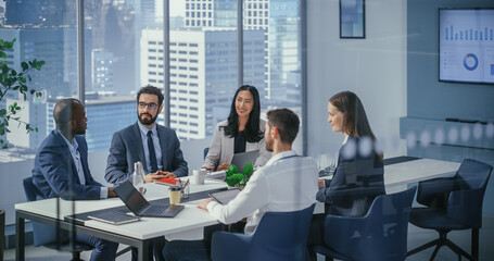 Modern Multi-Ethnic Office Conference Room Meeting: Diverse Team of Managers, Executives Talk,...