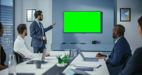 Office Conference, Meeting Presentation: Digital Startup Entrepreneurs Talks, Uses Green Screen Chroma Key Wall TV. Successfully Presenting e-Commerce Product to Group of Multi-Ethnic Investors
