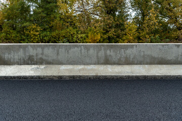 Dividing fence New Jersey between oppositely directed traffic flows. Road construction.