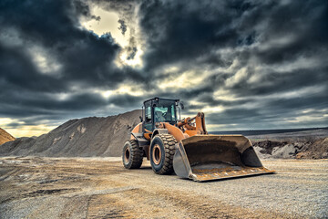 Loader in bulk materials warehouse