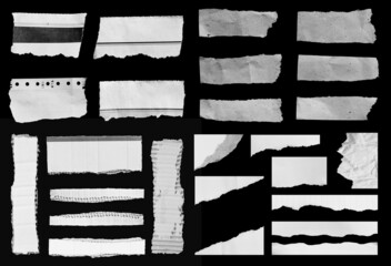 Set of ripped paper isolated on black background.