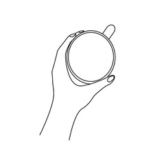 the girl's hand is holding a mug. View from above.  Linear style illustration