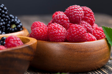 harvested red raspberries, close up