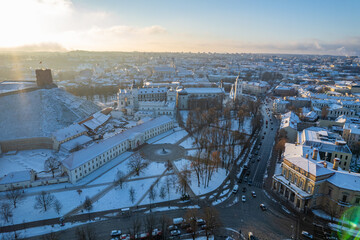 Aerial winter sunny frozen morning view of snowy Vilnius old town, Lithuania