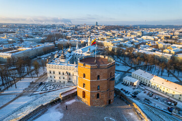 Aerial winter sunny frozen morning view of snowy Vilnius old town, Lithuania