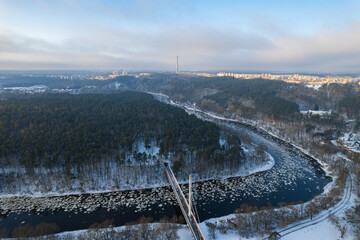 Aerial winter sunny frozen morning view of snowy Vingis park, Vilnius, Lithuania