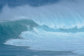 Sport photography. Jaws swell on International surfing event in Maui, Hawai 2021 December.