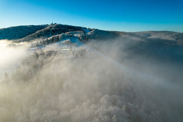 Jaworzyna Mountain Peak Above Clouds. Aerial Drone View