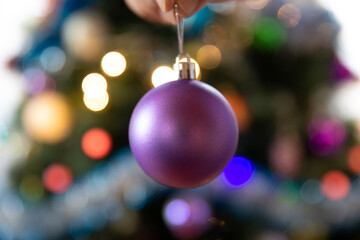 Soon Christmas and New Year, decorating the tree with toys