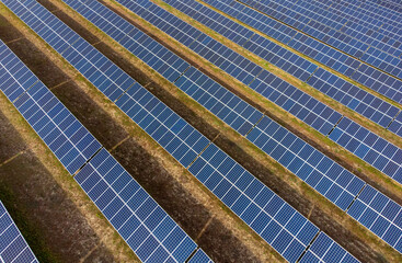 Aerial view of Solar panel, photovoltaic, alternative electricity source - concept of sustainable resources on a sunny day