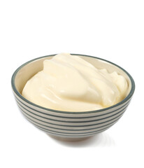 sour cream in a bowl isolated on white background