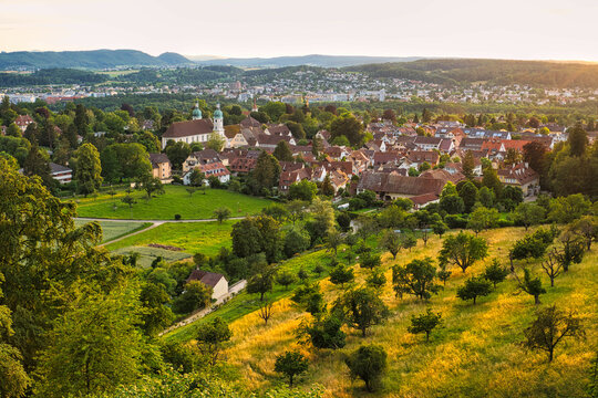 Golden-hour-view to Arlesheim with Arlesheim Cathedral and other parts of Basel-Country, Switzerland.