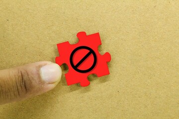Red puzzle with no entry icon. the concept of prohibition