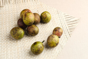 Matoa fruit from Papua, Indonesia. Matoa contains vitamin, nutrients and antioxidant. Selective focus image.
