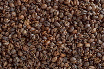 Roasted coffee beans top view. Coffee beans background