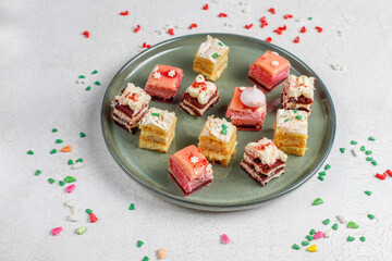 Delicious christmas dessert slices decorated with sprinkles.