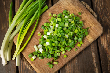 spring onion sliced for salad or seasoning on wooden surface