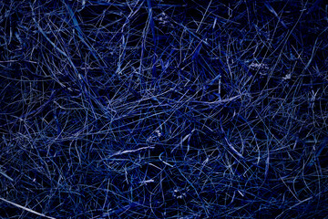 Hay background or texture, dried grass, toned in blue color
