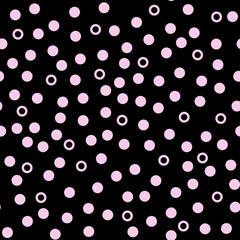 Polka dot seamless vector background. Chaotic pink circles on a black background. Abstract background. Template for packaging, notebooks, cards, wallpaper, textiles and other uses.