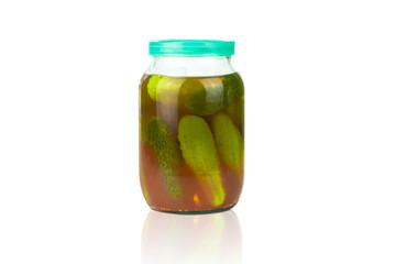 Canned сucumbers in a glass jar on a white background, the concept of canning, fermentation