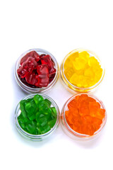 Jelly vitamins candy teddy bears isolate on a white background. Selective focus.