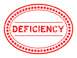 Grunge red deficiency word oval rubber seal stamp on white background
