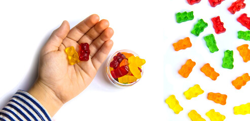 Jelly vitamins candy teddy bears isolate on a white background. Selective focus.