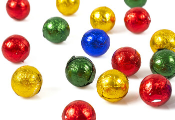 chocolate candies wrapped in colorfull shining paper - 476424209