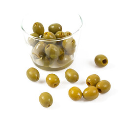 Green olives on a white background. Olives on a white background. Top view. Pitted green olives on white background. Close up.