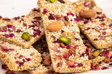 Winter Delicacy Makar Sankranti Or Lohri Mithai Gulab Gajak Also Known As Gur Gajjak, Gazak, Gachak Til Patti Or Papdi, Chikki Is Made Of Rose, Sesame Seeds, Jaggery Gud, Almonds Badam And Pistachio