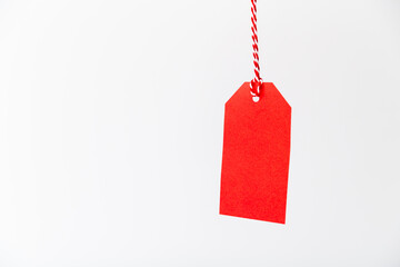 Blank red price tag isolated on white background. Black friday, sale, discount concept.