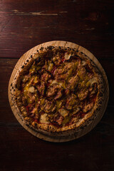 Delicious Pizza Burger Classic Homemade Tomato Sauce Sausage Cheese Onion Chicken Meat Pasta Shrimp Restaurant Menu Gourmet on a wooden table